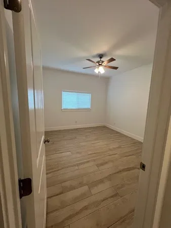 a bathroom with a sink a toilet and bathtub