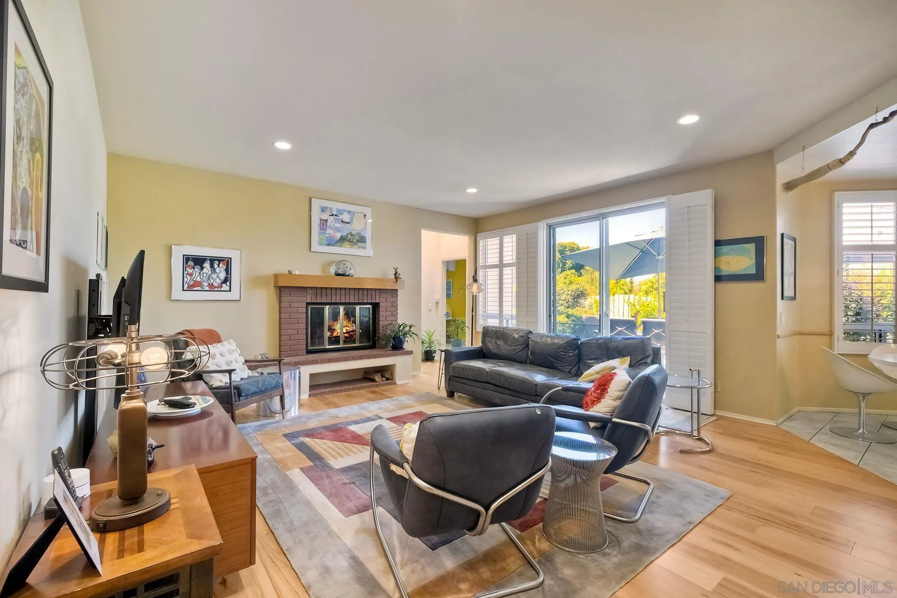 15892 Bent Tree Road Poway, CA 92064 - Photo 11 of 56 a living room with fireplace furniture and a flat screen tv