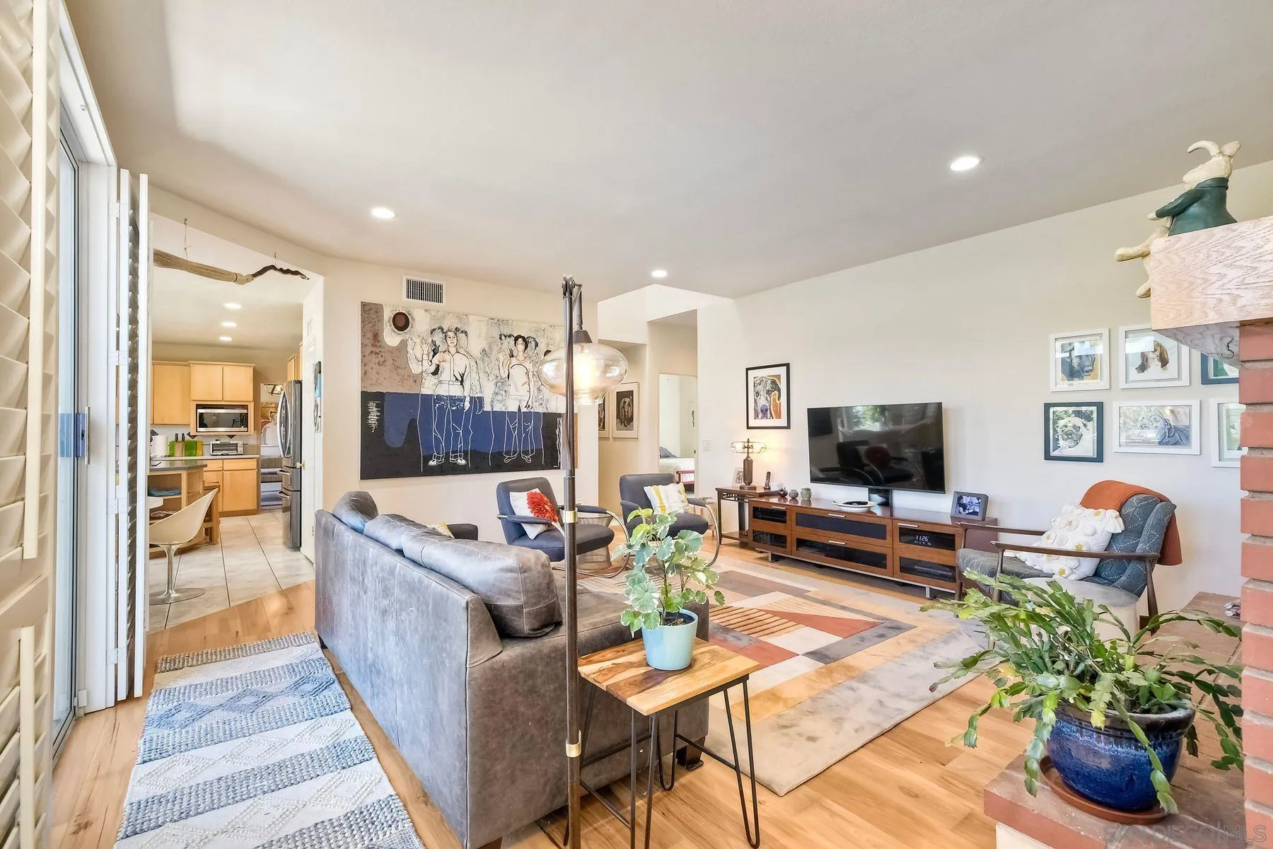 15892 Bent Tree Road Poway, CA 92064 - Photo 12 of 56 a living room with furniture and a flat screen tv