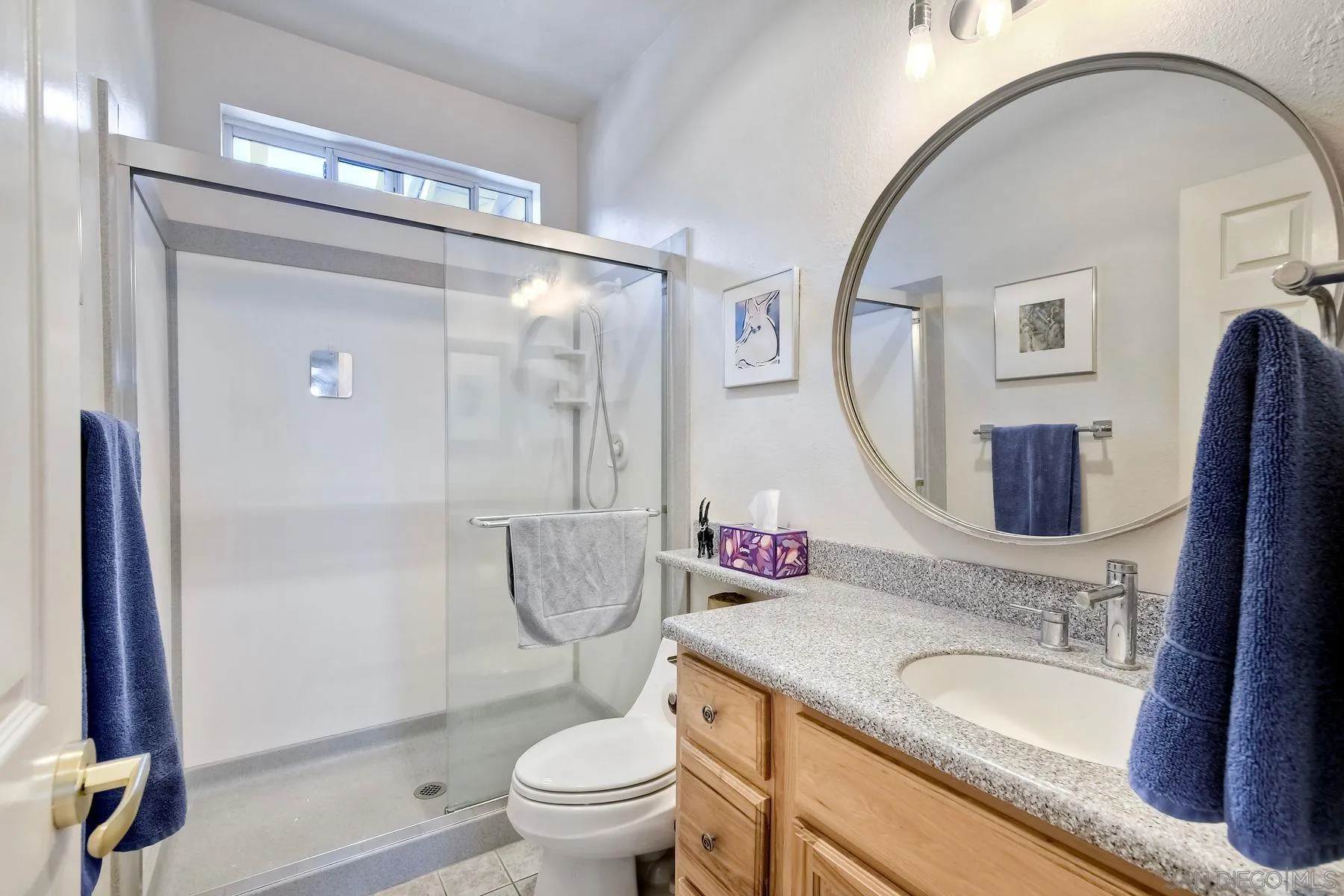 15892 Bent Tree Road Poway, CA 92064 - Photo 20 of 56 a bathroom with a granite countertop sink a toilet a mirror and shower