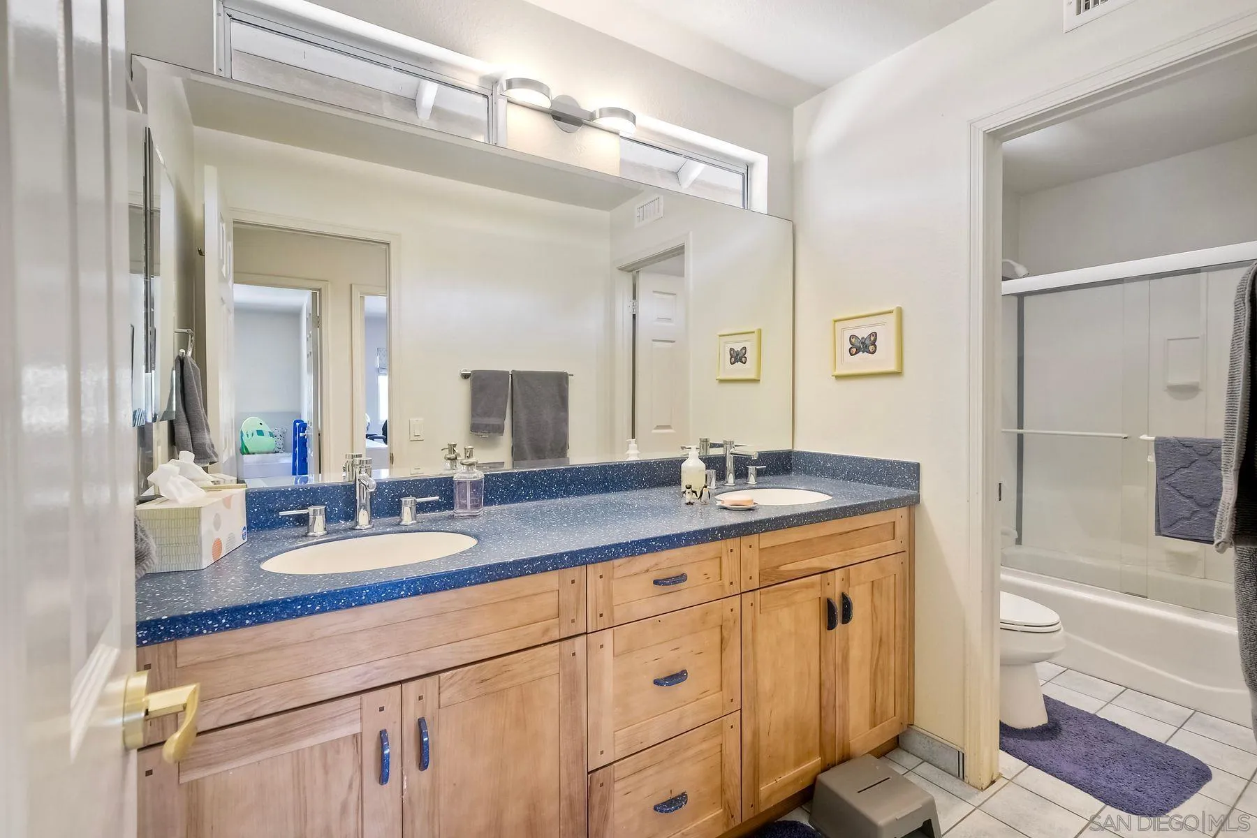15892 Bent Tree Road Poway, CA 92064 - Photo 24 of 56 a bathroom with a granite countertop sink mirror and double