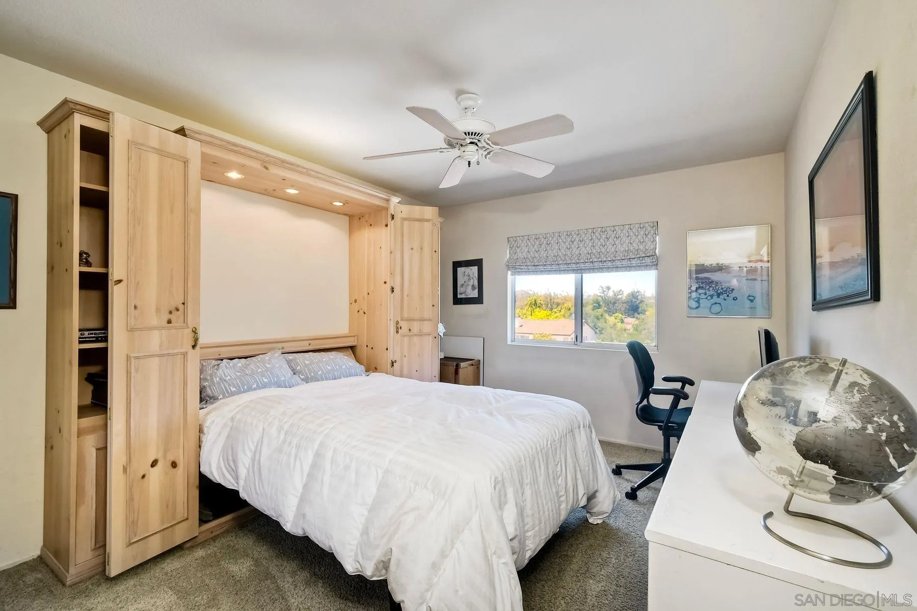 15892 Bent Tree Road Poway, CA 92064 - Photo 25 of 56 a bedroom with a bed and glass walk in closet