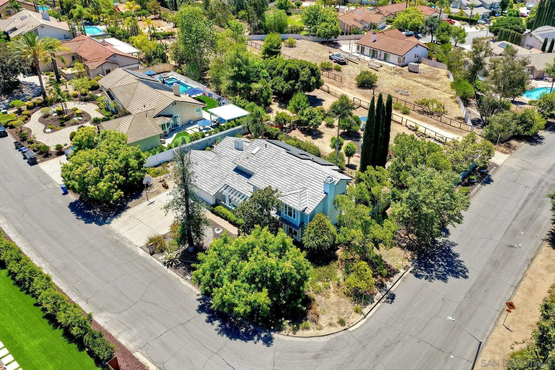 15892 Bent Tree Road Poway, CA 92064 - Photo 42 of 56 an aerial view of a house with a yard and garden