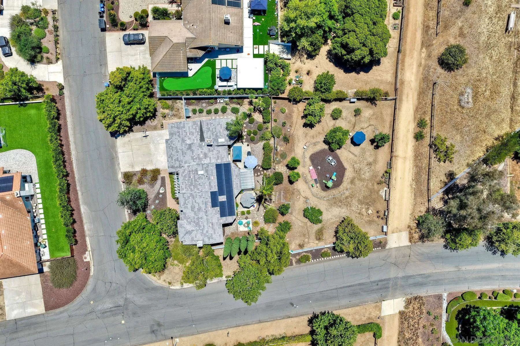 15892 Bent Tree Road Poway, CA 92064 - Photo 46 of 56 an aerial view of a house with a yard and garden