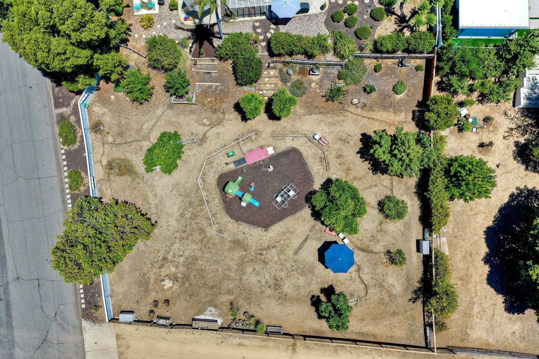 15892 Bent Tree Road Poway, CA 92064 - Photo 51 of 56 an aerial view of a house with a yard and potted plants