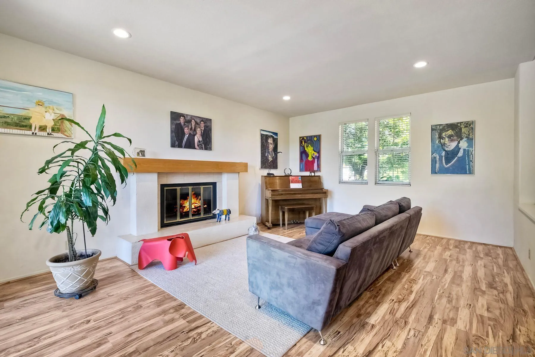 15892 Bent Tree Road Poway, CA 92064 - Photo 6 of 56 a living room with furniture and a fireplace