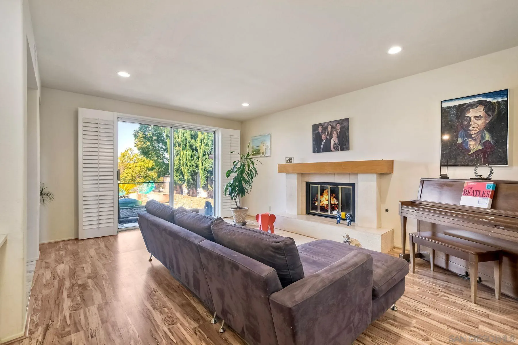 15892 Bent Tree Road Poway, CA 92064 - Photo 7 of 56 a living room with furniture and a fireplace