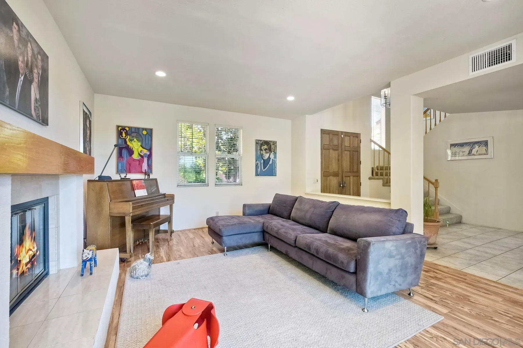 15892 Bent Tree Road Poway, CA 92064 - Photo 8 of 56 a living room with furniture and a flat screen tv