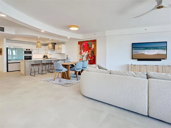 a bathroom with a double vanity sink a toilet and a mirror