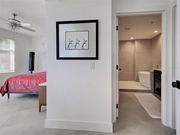 a bathroom with a tub and a shower