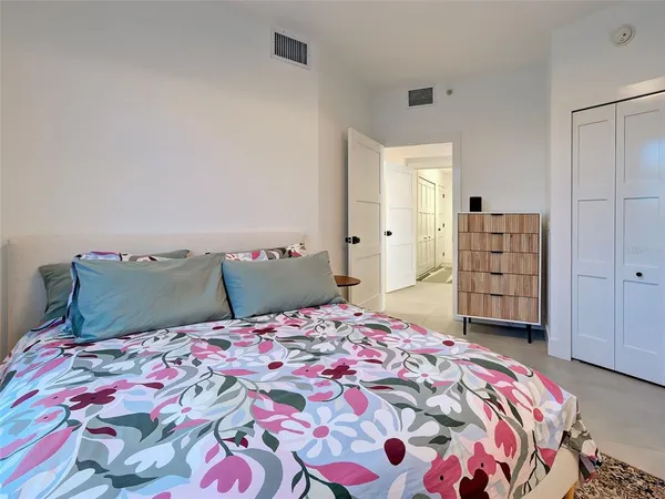 a view of a swimming pool with a bench