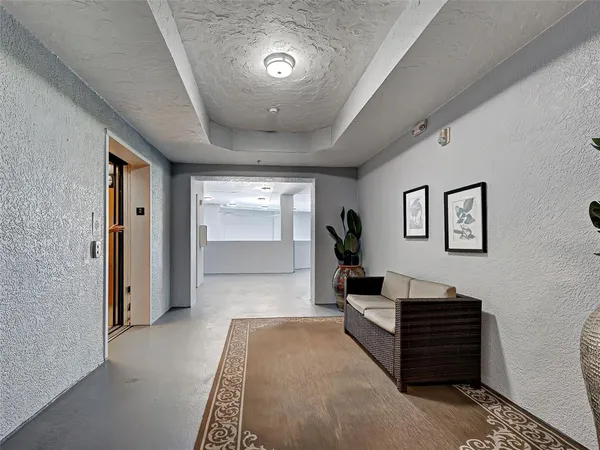 a black and white building with a lot of windows