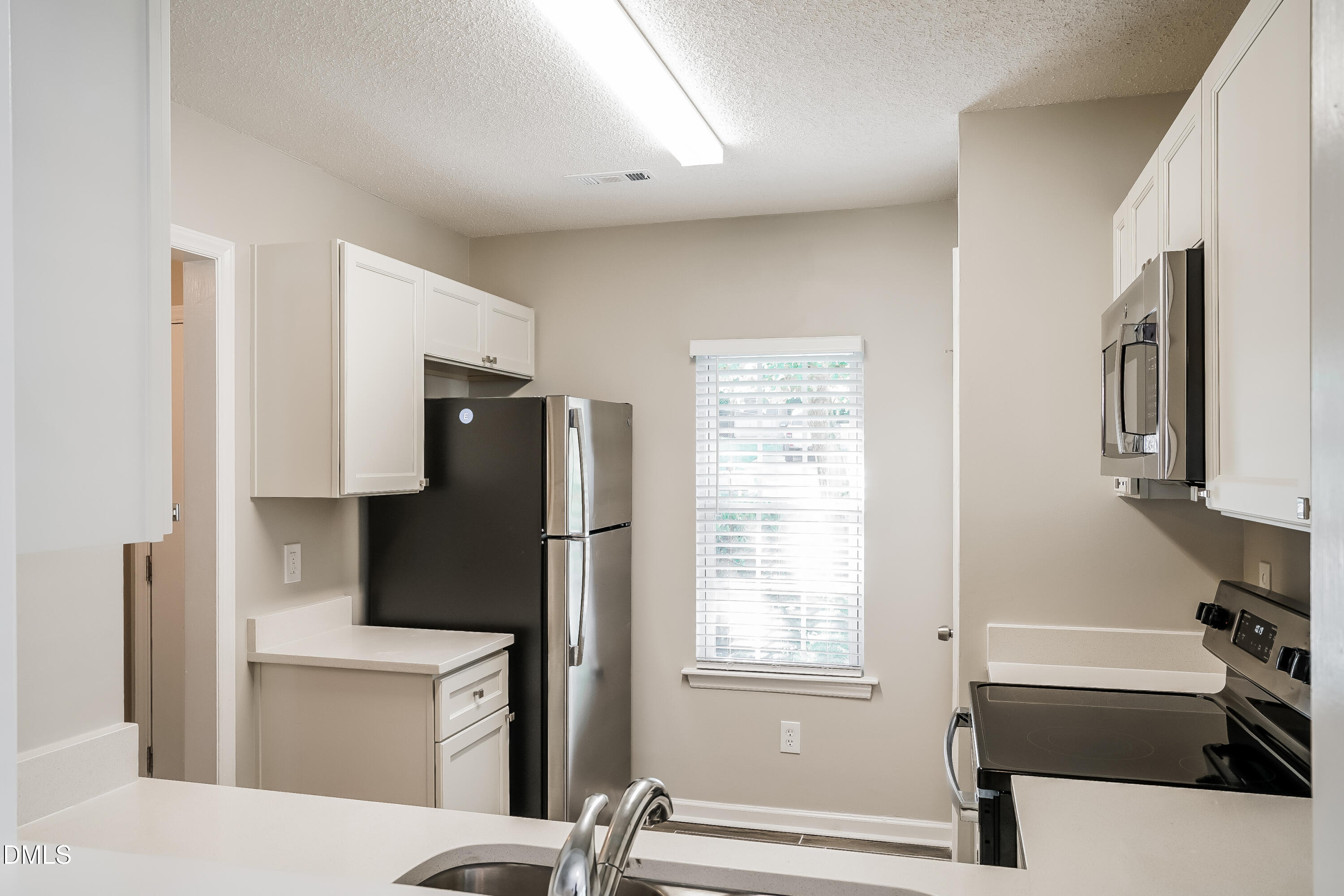 1915 Collier Road Durham, NC 27707 - Photo 6 of 16 021-photo-kitchen-11980347