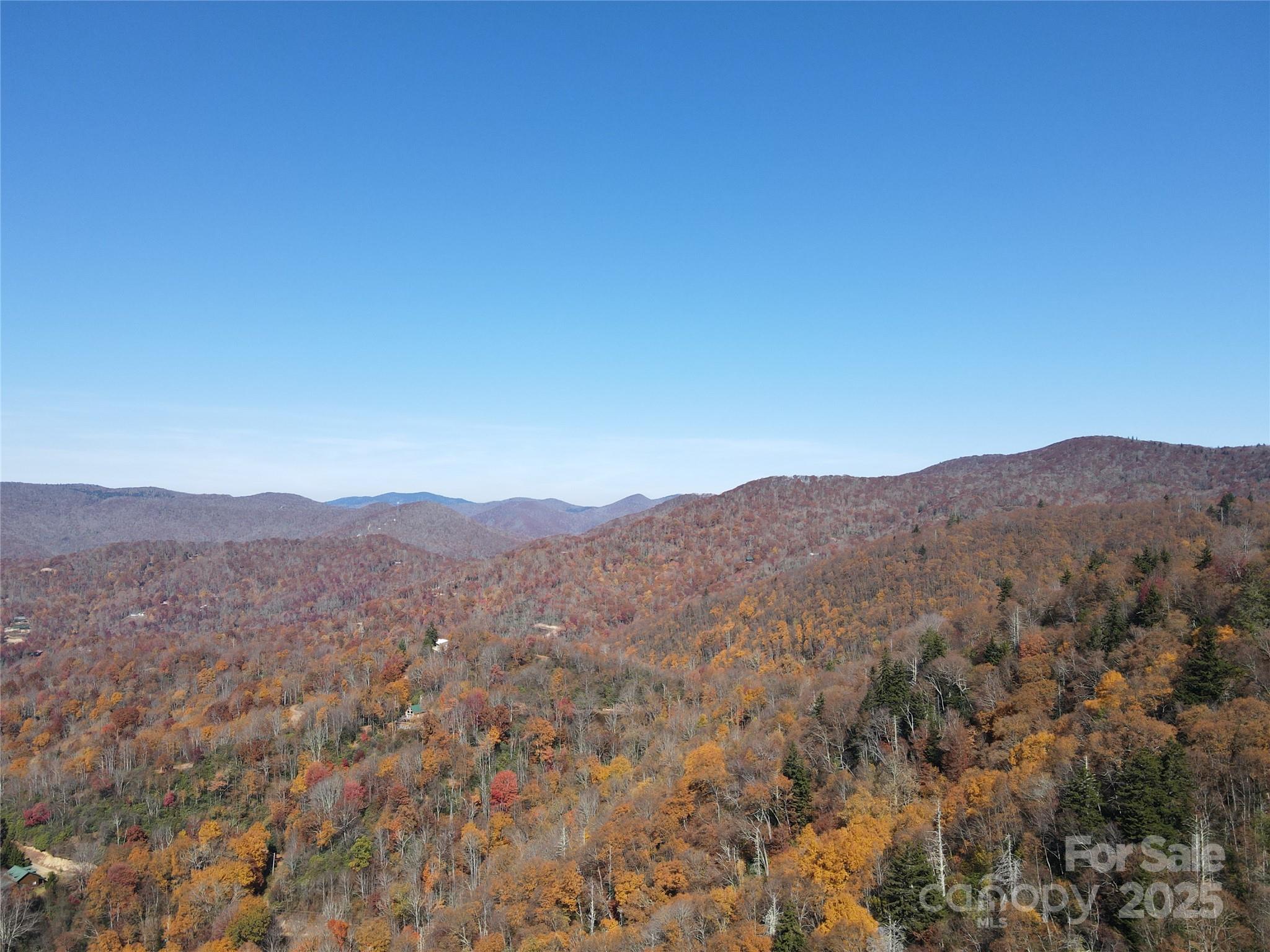 3689 Plott Balsam Road Maggie Valley, NC 28751 - Photo 19 of 33 a view of a mountain range with trees in the background