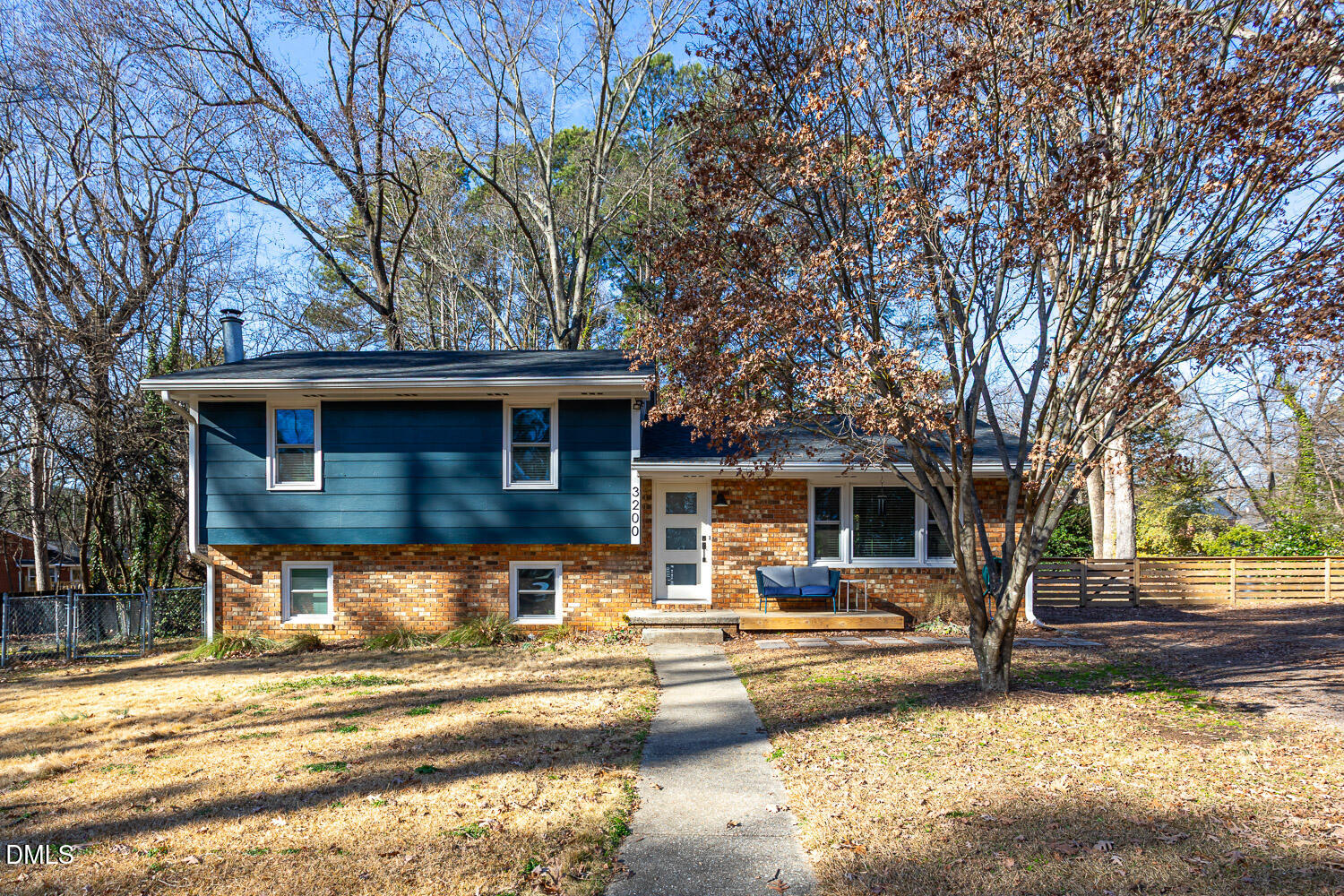a view of a house with backyard and snow