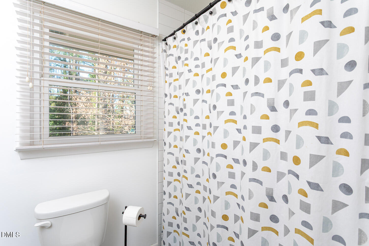 3200 Fairforest Place Raleigh, NC 27604 - Photo 17 of 40 a white toilet sitting next to a shower curtain