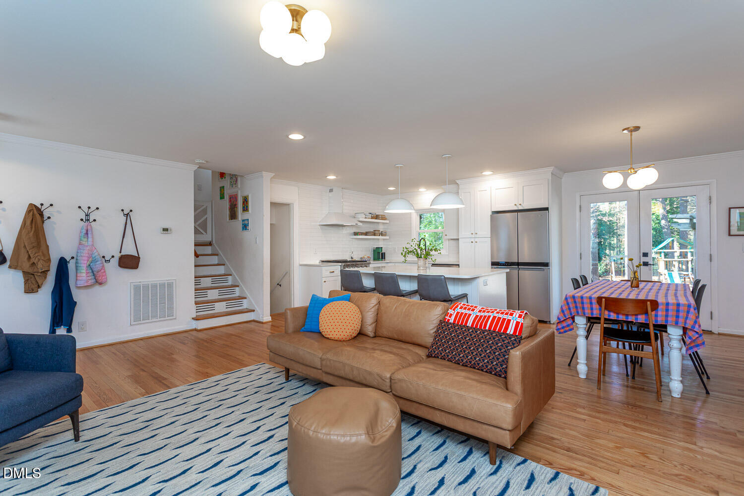 3200 Fairforest Place Raleigh, NC 27604 - Photo 5 of 40 a living room with furniture kitchen view and a wooden floor
