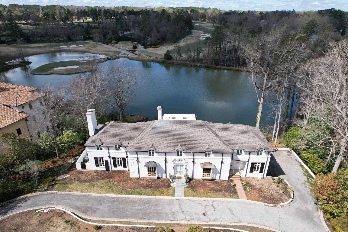 2805 Lakeview Drive Raleigh, NC 27608 - Photo 1 of 28 an aerial view of a house with yard swimming pool and lake view