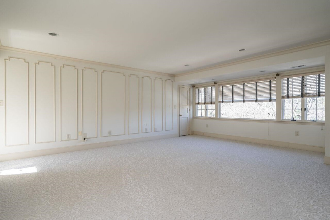 2805 Lakeview Drive Raleigh, NC 27608 - Photo 18 of 28 a view of an empty room with a window