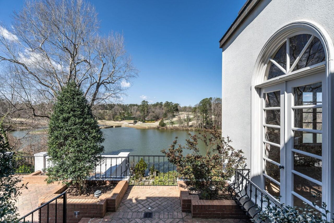 2805 Lakeview Drive Raleigh, NC 27608 - Photo 22 of 28 a view of multiple houses with a yard