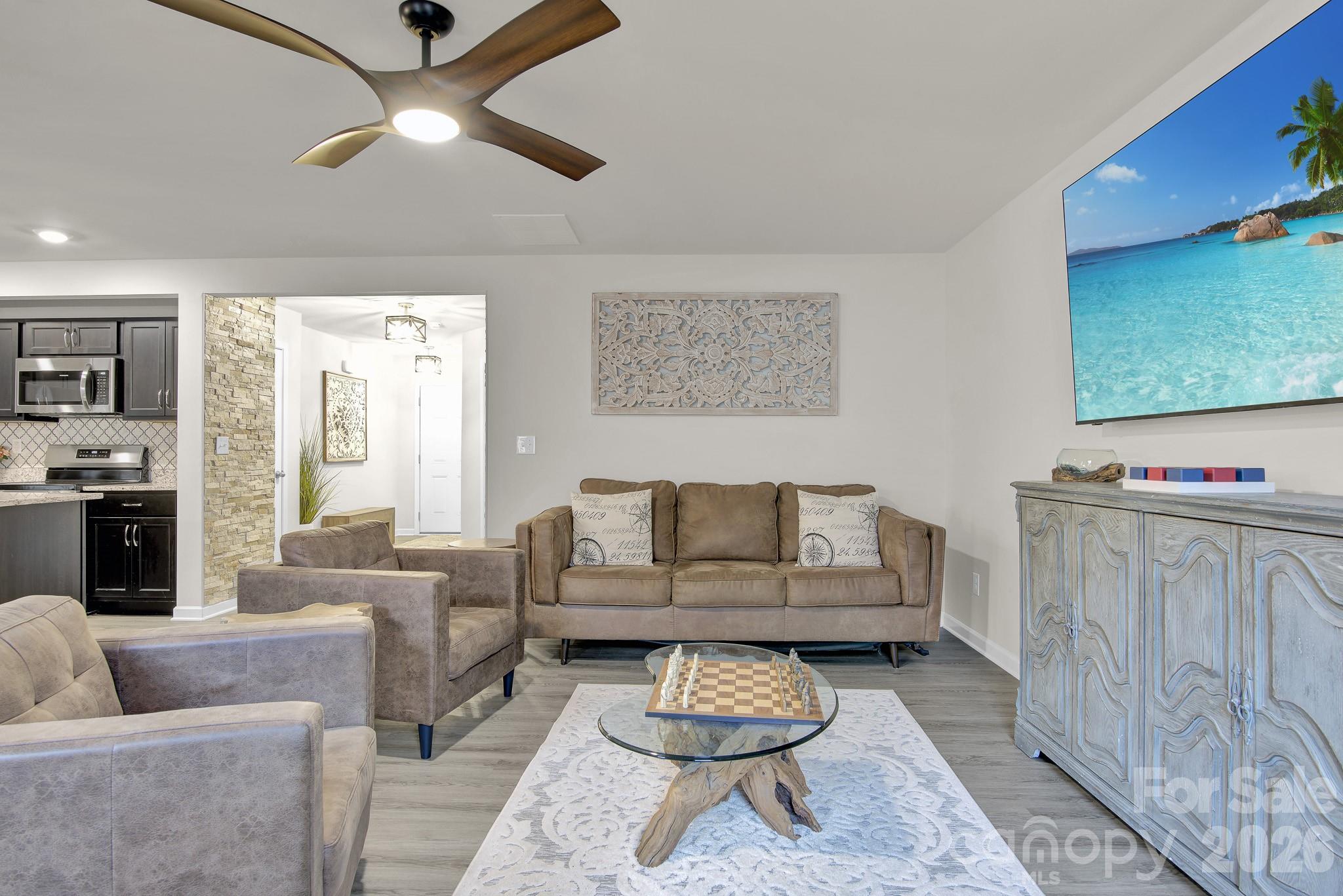 865 Old Linwood Road Lexington, NC 27292 - Photo 17 of 44 a living room with furniture and a rug