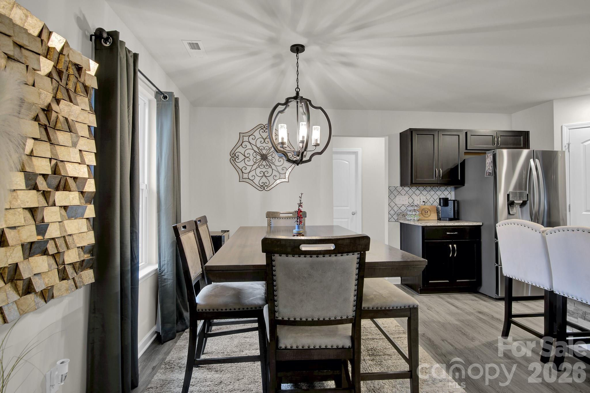 865 Old Linwood Road Lexington, NC 27292 - Photo 20 of 44 a dining room with furniture and window