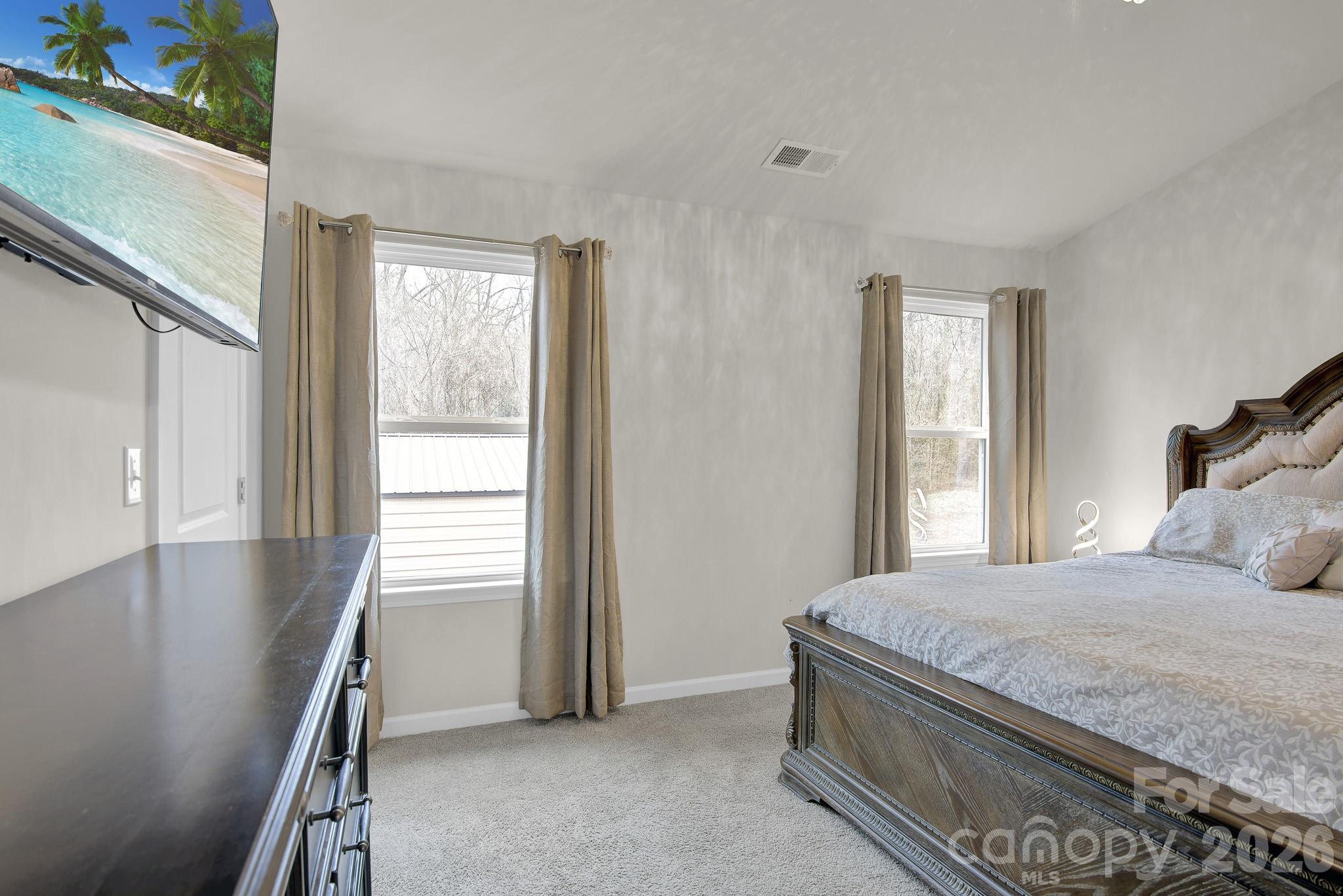 865 Old Linwood Road Lexington, NC 27292 - Photo 29 of 44 a bedroom with a bed and a window
