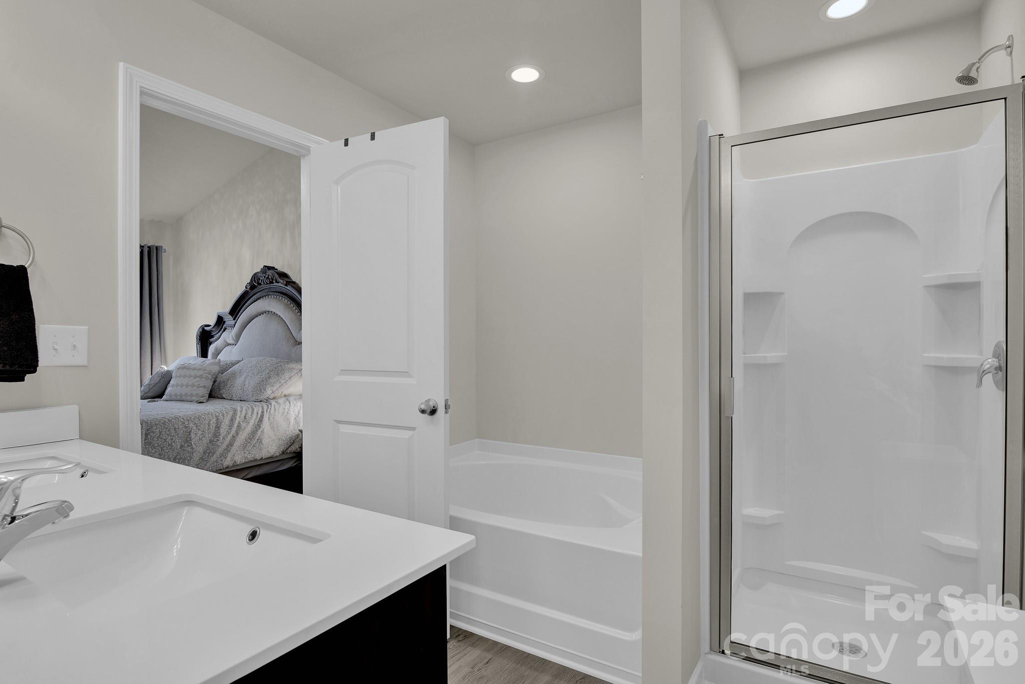 865 Old Linwood Road Lexington, NC 27292 - Photo 31 of 44 a bathroom with a bathtub and a shower