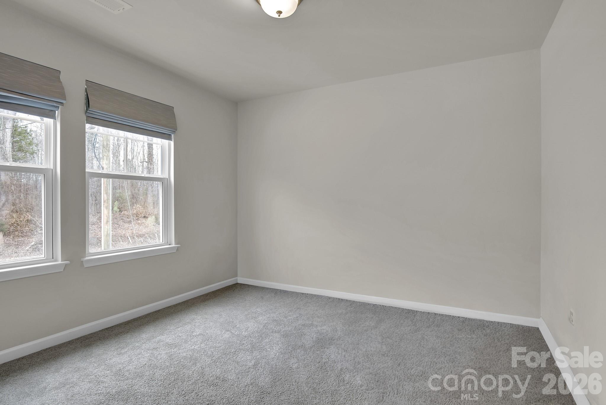 865 Old Linwood Road Lexington, NC 27292 - Photo 36 of 44 an empty room with a window