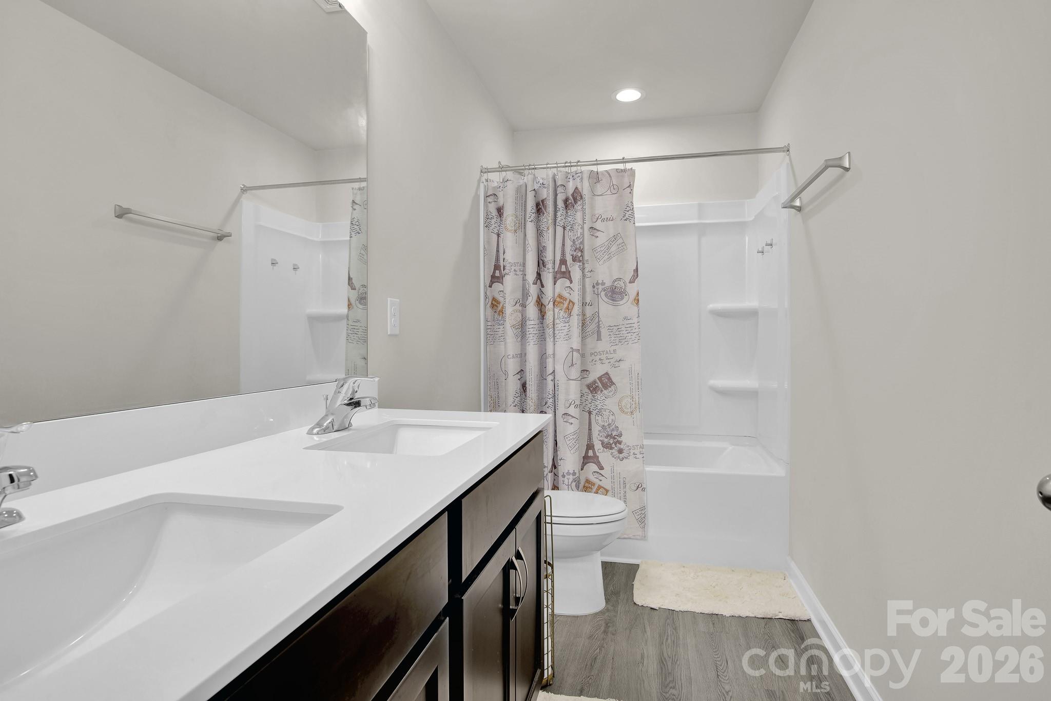 865 Old Linwood Road Lexington, NC 27292 - Photo 42 of 44 a bathroom with a sink a toilet a shower and a mirror