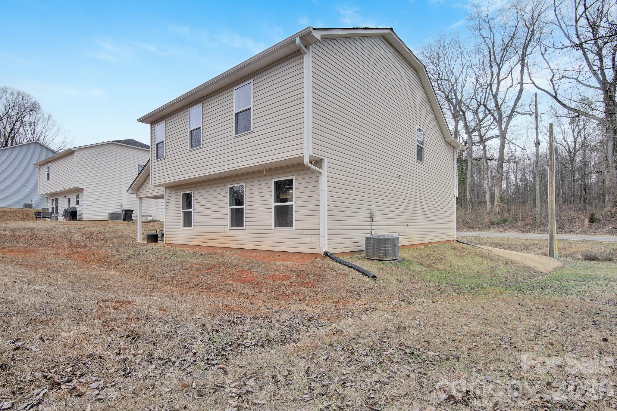 865 Old Linwood Road Lexington, NC 27292 - Photo 6 of 44 a view of a house with a backyard