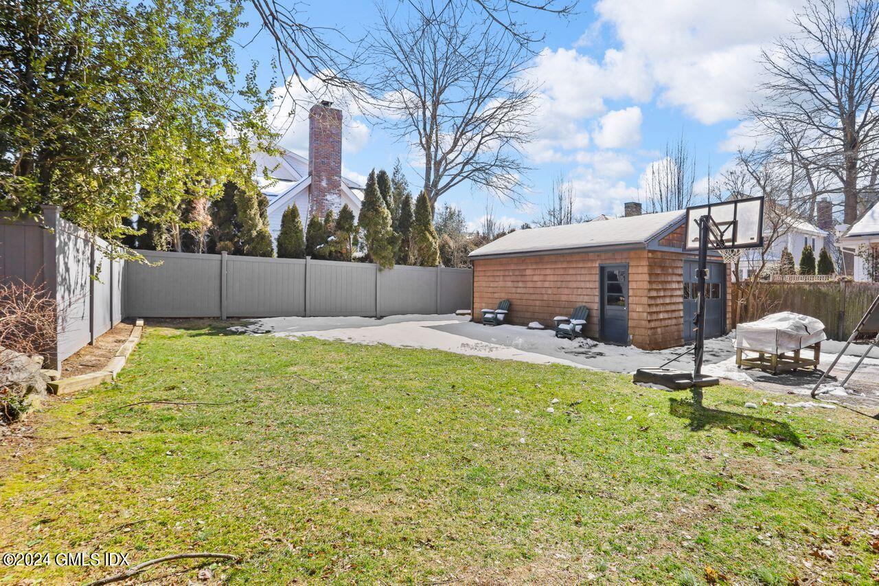17 Center Road Old Greenwich, CT 06870 - Photo 23 of 30 a view of a house with backyard and sitting area