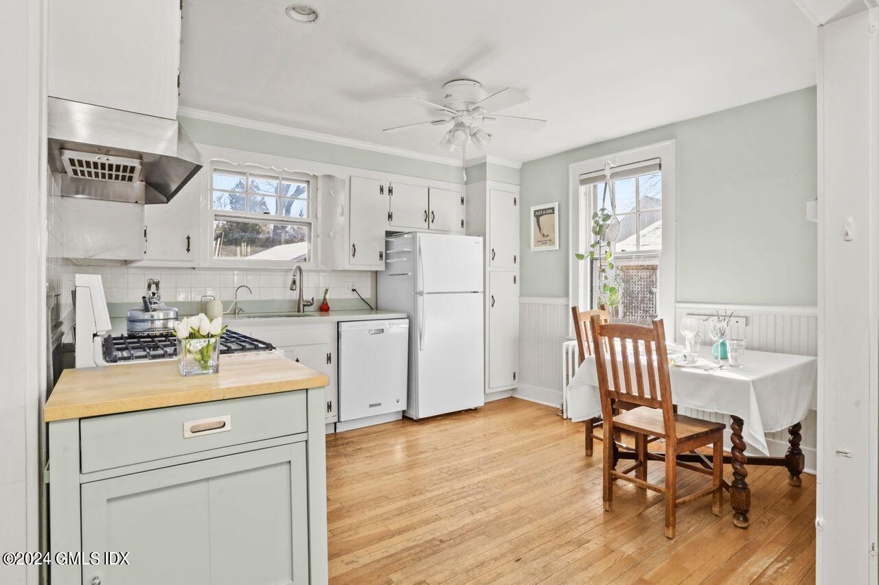 17 Center Road Old Greenwich, CT 06870 - Photo 3 of 30 a view of a kitchen with cabinets and wooden floor