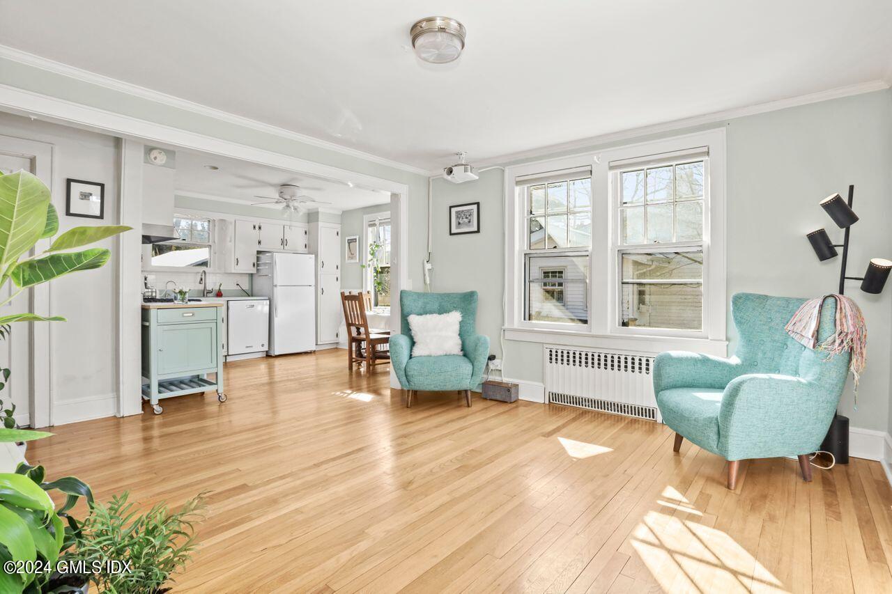 17 Center Road Old Greenwich, CT 06870 - Photo 7 of 30 a living room with furniture and a large window