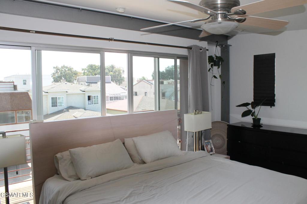 369 Cahuenga Drive Oxnard, CA 93035 - Photo 14 of 36 a living room with furniture and a large window