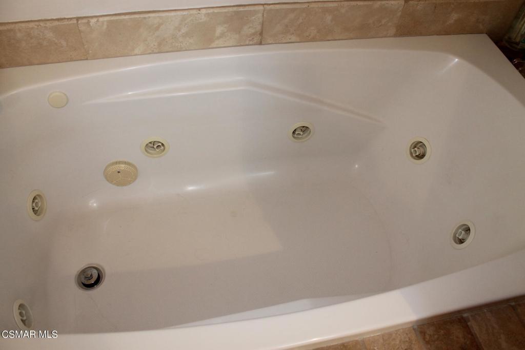 369 Cahuenga Drive Oxnard, CA 93035 - Photo 17 of 36 a bathroom with a tub