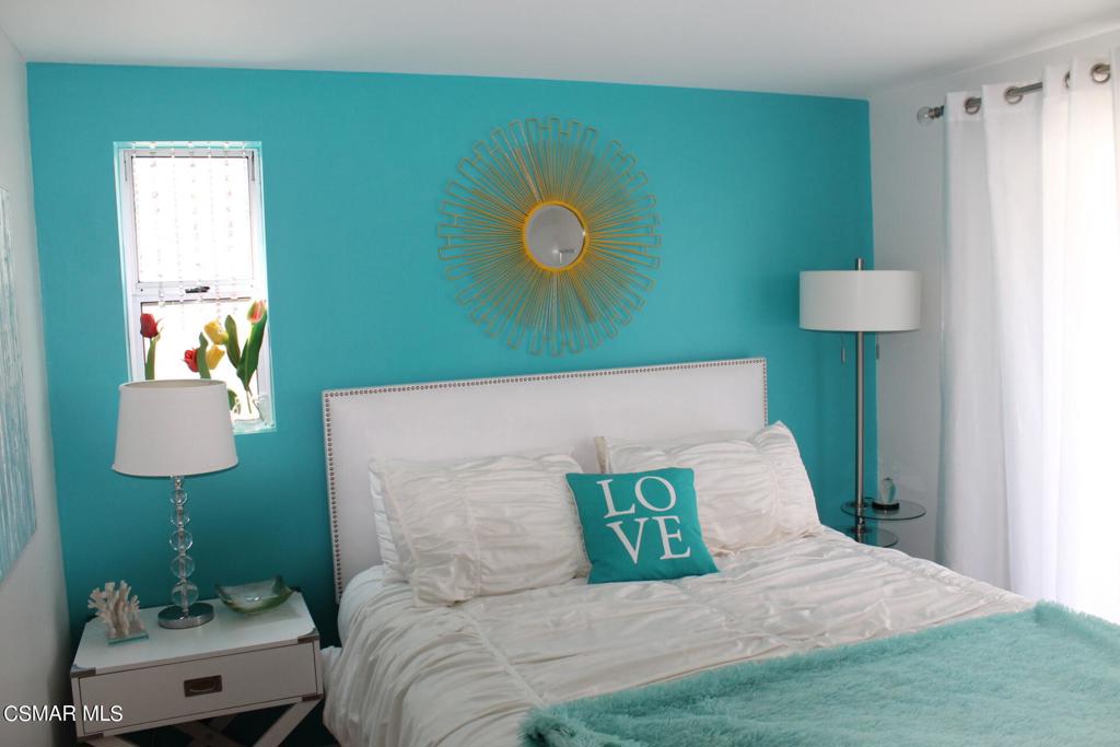 369 Cahuenga Drive Oxnard, CA 93035 - Photo 20 of 36 a bed sitting in a bedroom next to a window