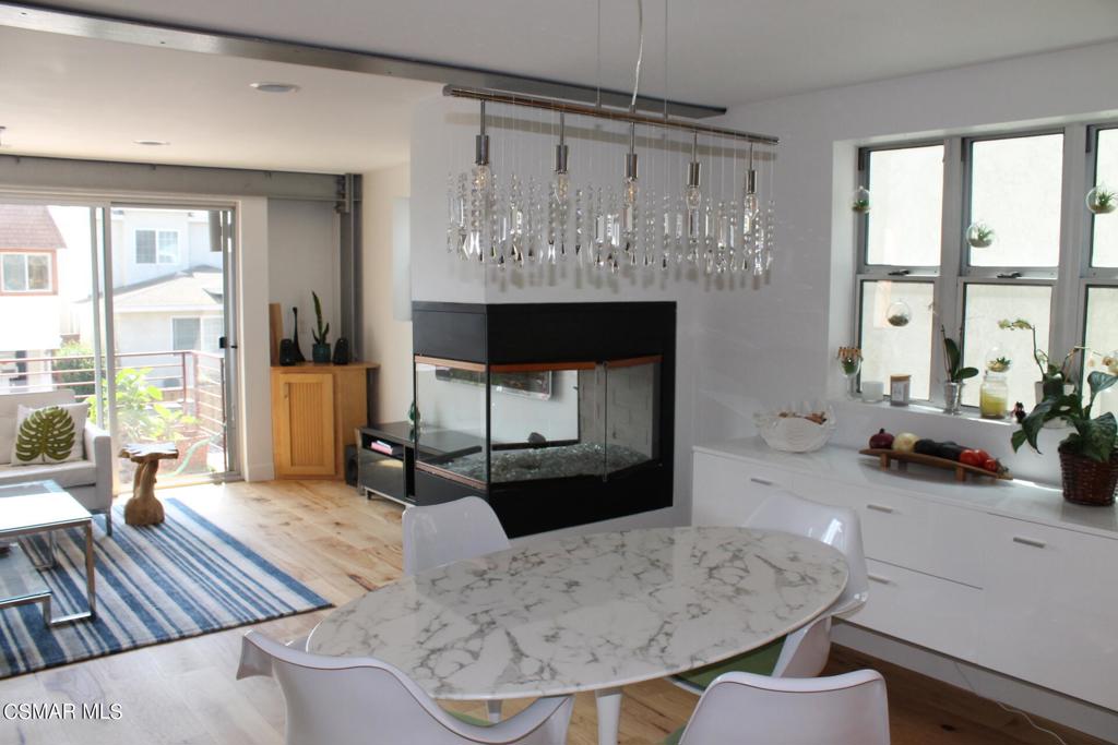 369 Cahuenga Drive Oxnard, CA 93035 - Photo 2 of 36 a living room with furniture and a fireplace