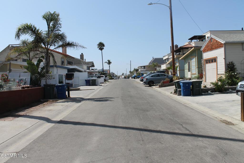 369 Cahuenga Drive Oxnard, CA 93035 - Photo 33 of 36 a view of a street with houses on the road
