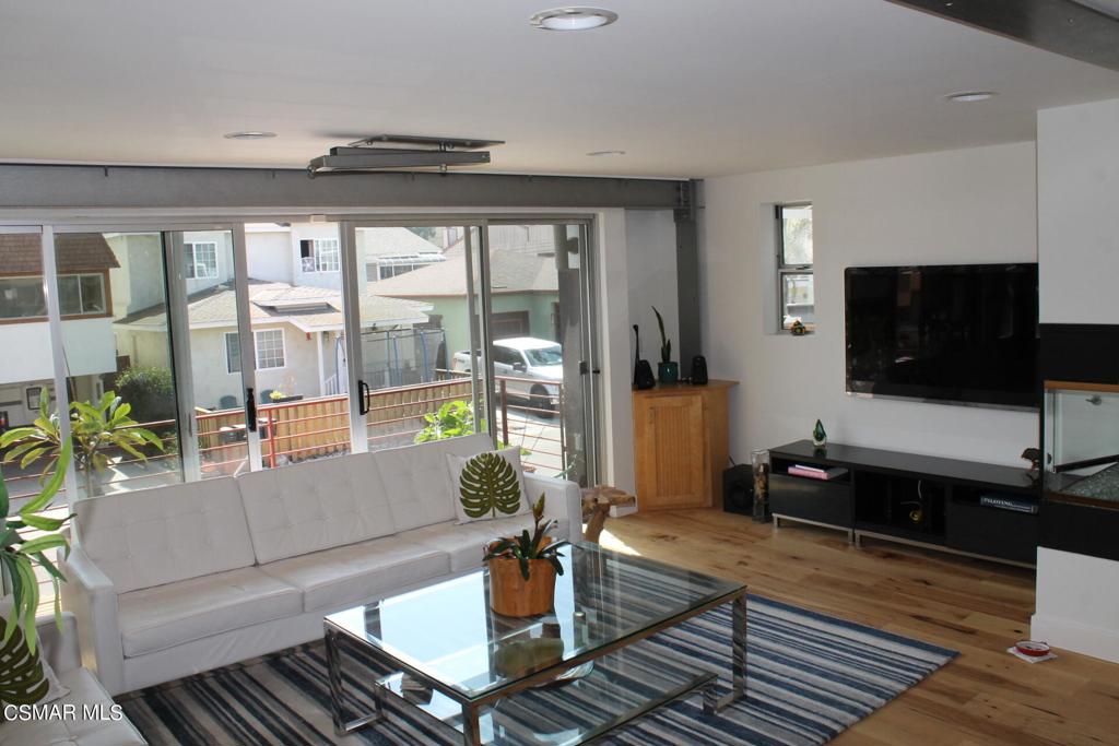 369 Cahuenga Drive Oxnard, CA 93035 - Photo 5 of 36 a living room with furniture and a flat screen tv