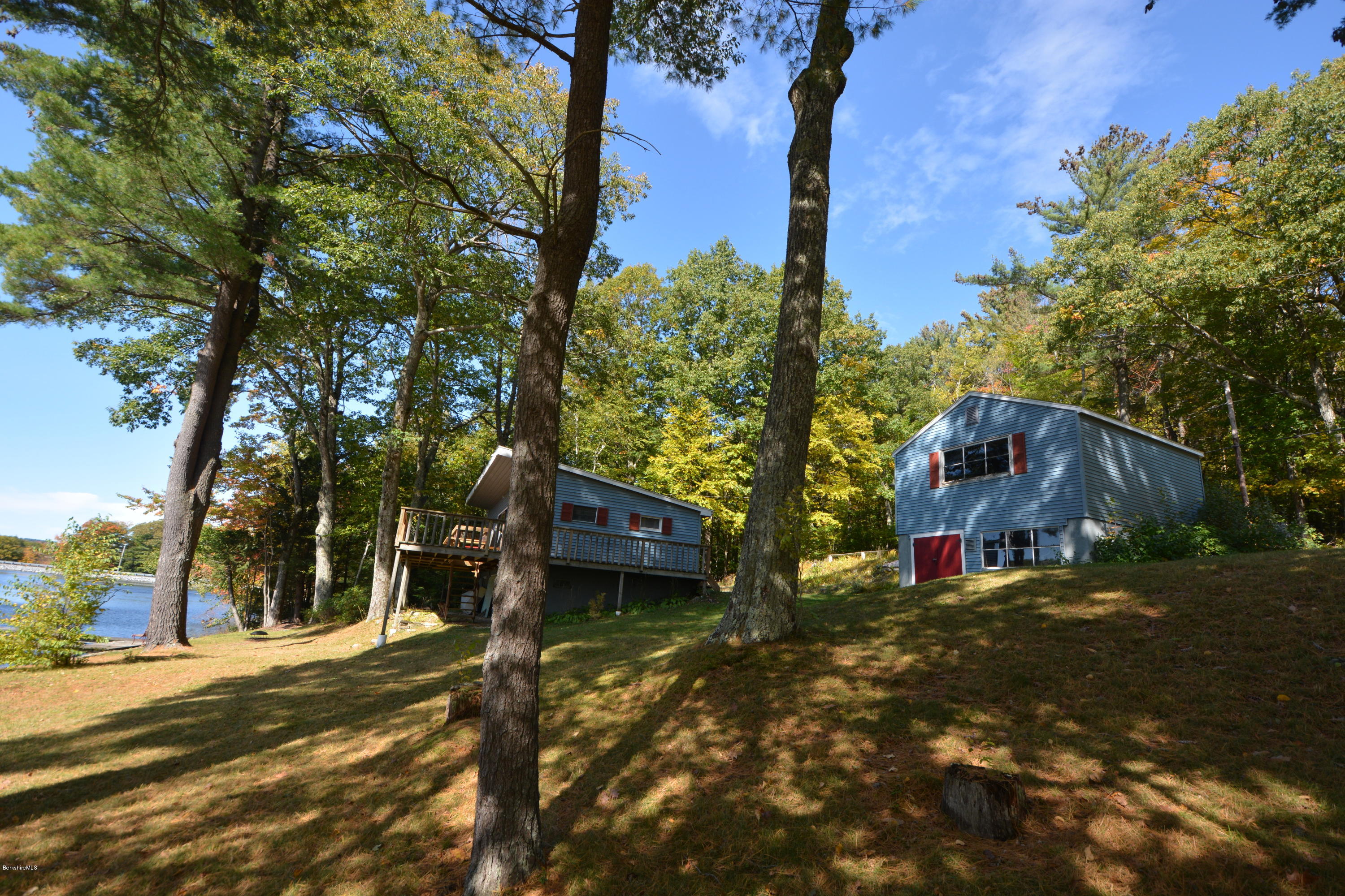 74 Kibbe Road Otis, MA 01029 - Photo 3 of 5 a view of a town with large trees