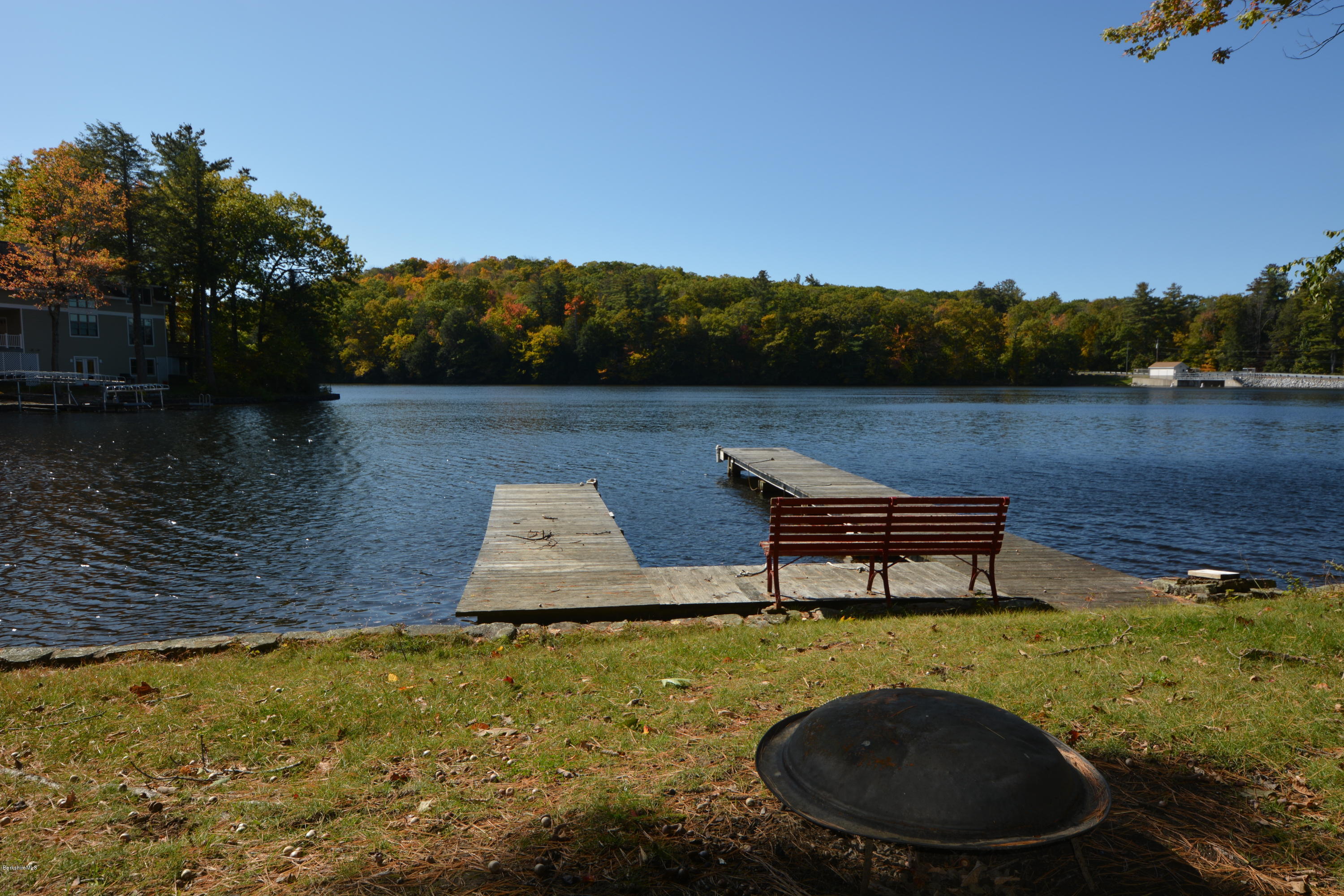 74 Kibbe Road Otis, MA 01029 - Photo 4 of 5 a swimming pool with outdoor seating and yard