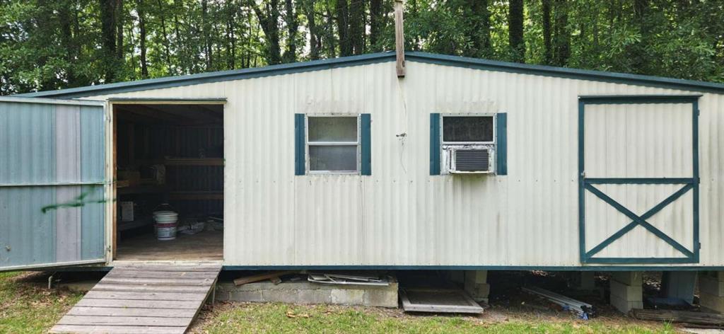 389 Collins Road Toccoa, GA 30577 - Photo 12 of 15 a front view of a house with a garage