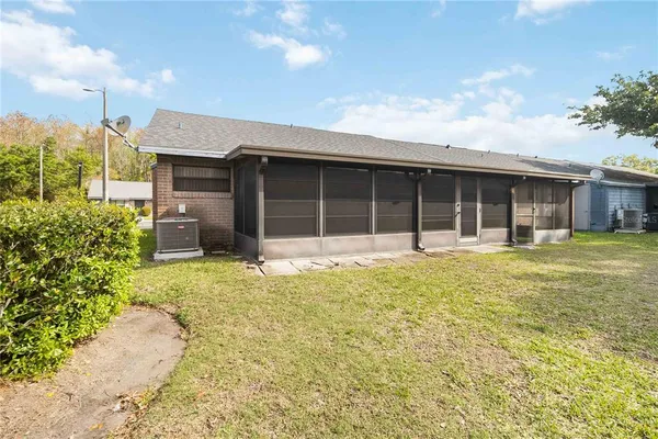 a house view with a garden space