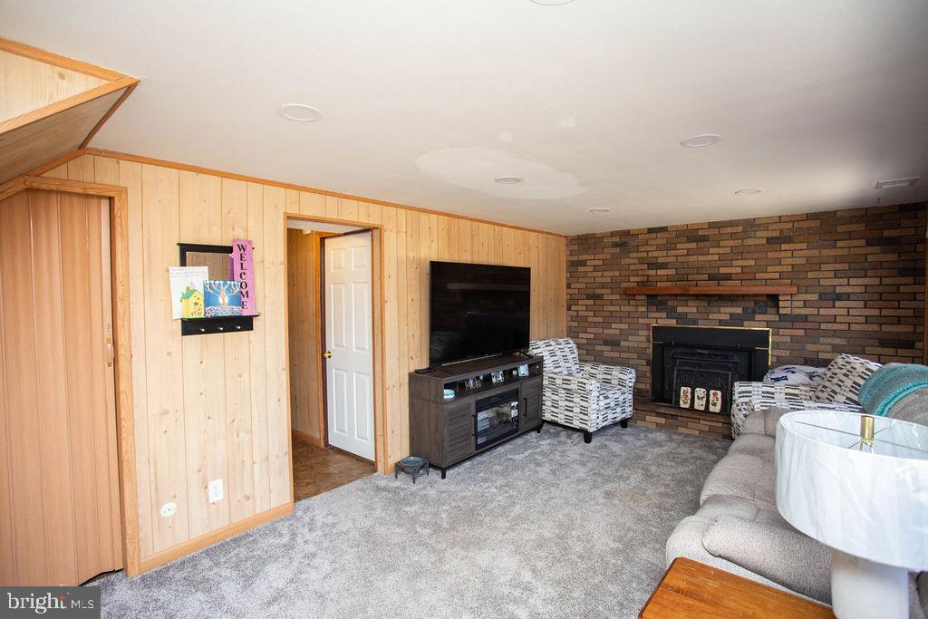 117 Meadowlark Road Stratford, NJ 08084 - Photo 34 of 58 Den (level 1) features new carpeting