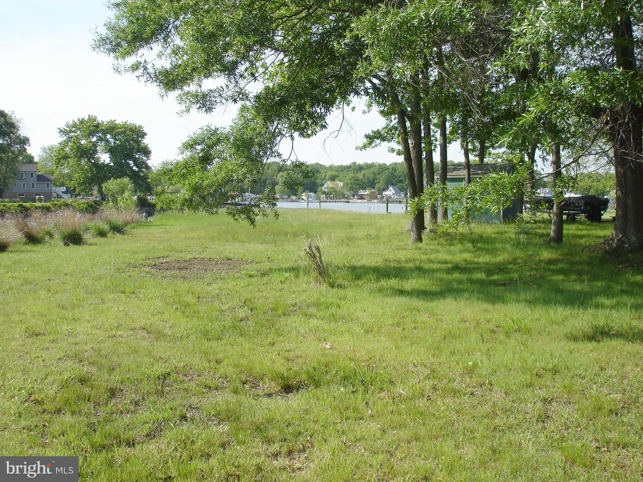 3720 Chestnut Road Middle River, MD 21220 - Photo 11 of 12 a view of outdoor space with green field and trees