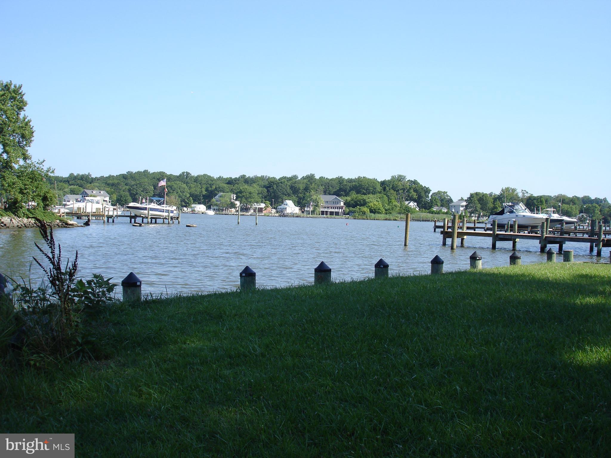 3720 Chestnut Road Middle River, MD 21220 - Photo 3 of 12 a view of a lake with houses in the back