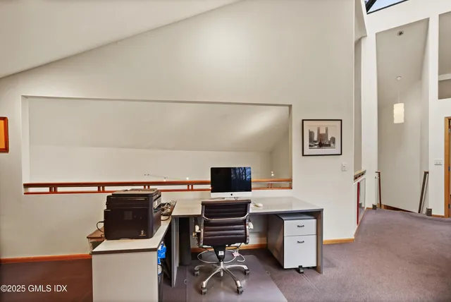 a bathroom with a sink a mirror and a toilet