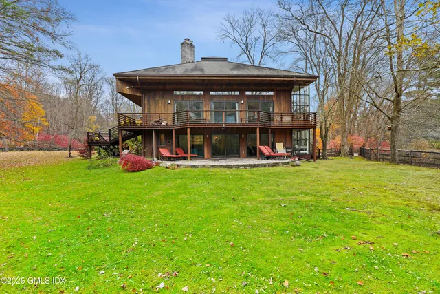 a front view of a house with swimming pool