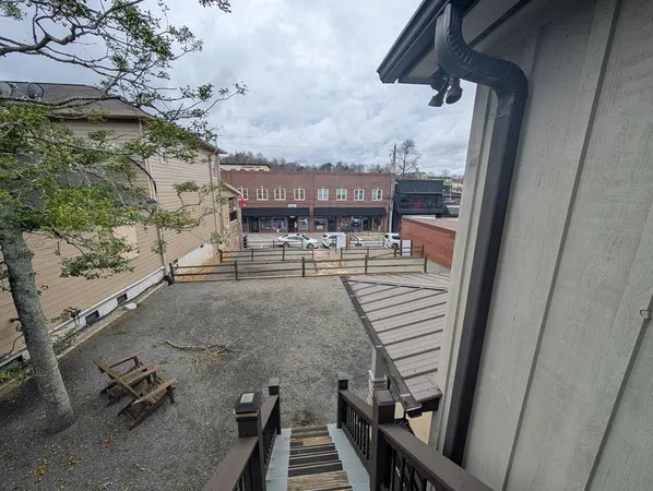 a view of a terrace with chairs